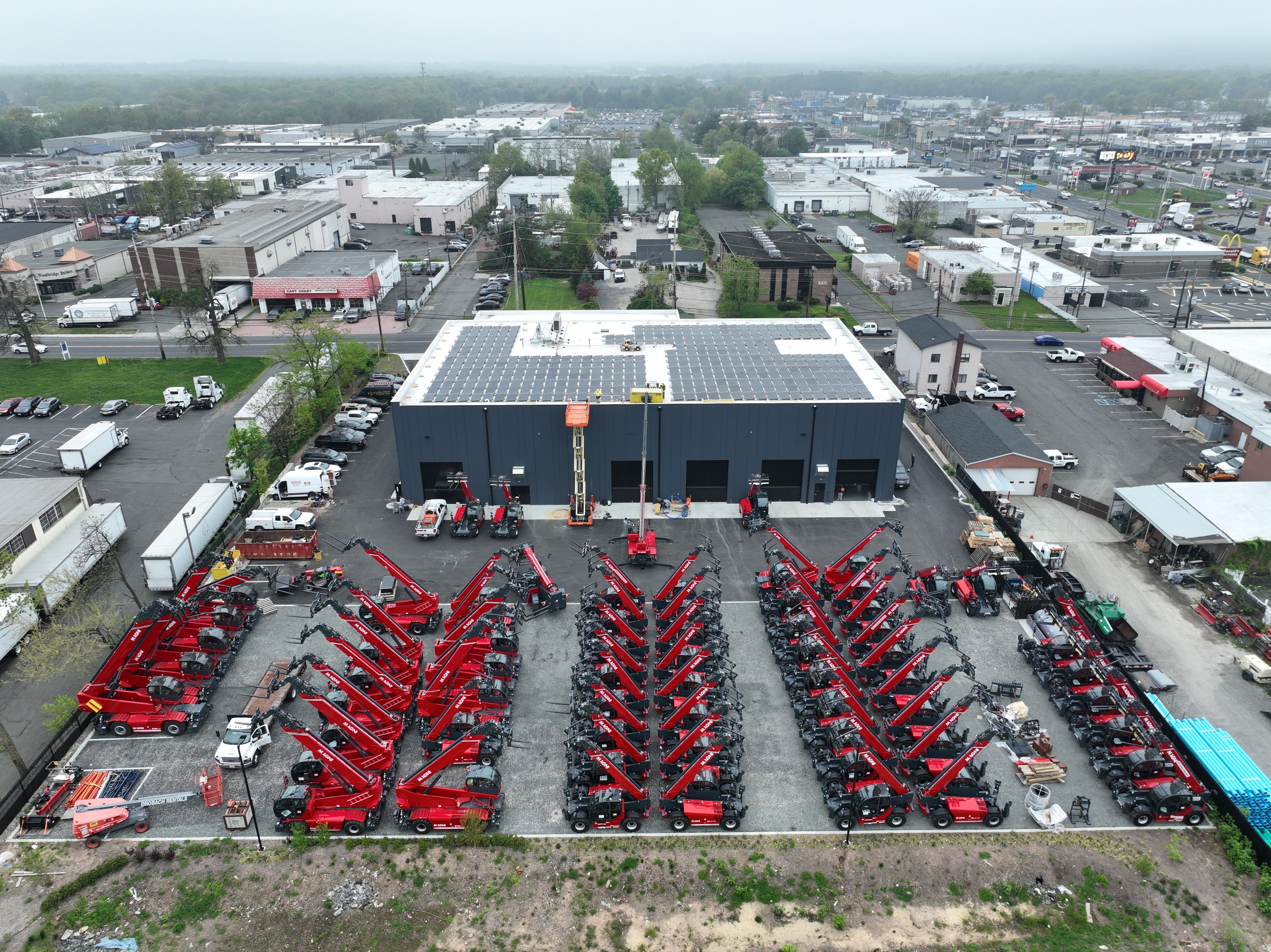 Aerial overview of completed Magni America facility with equipment yard