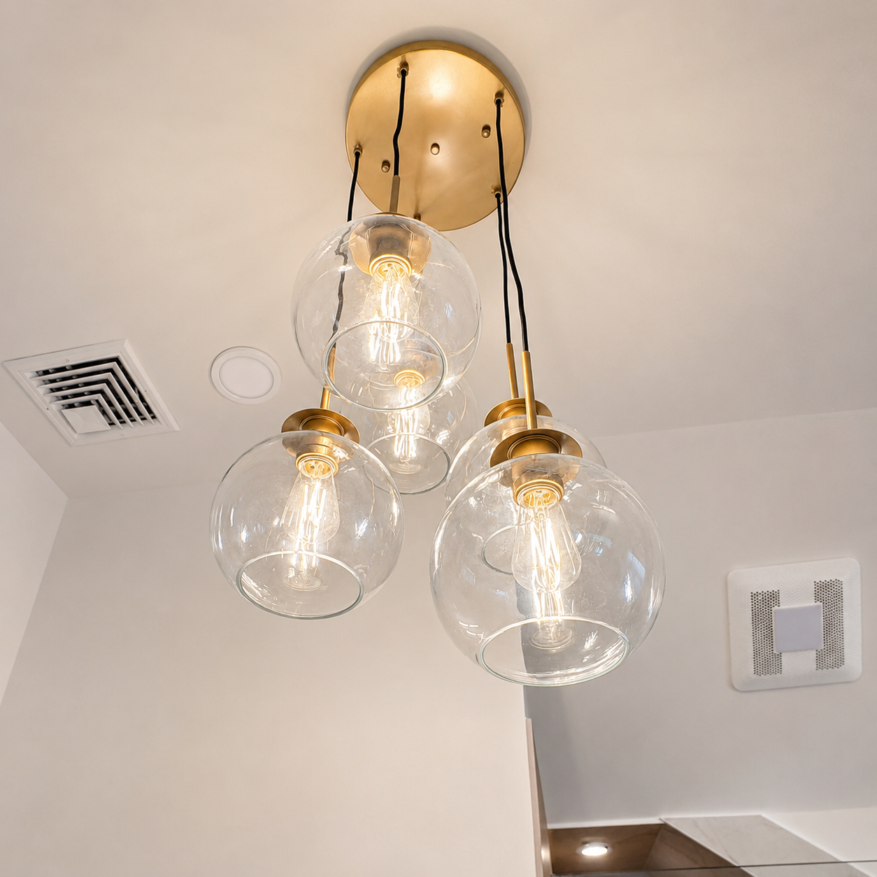 Makeover on Maye — brass globe pendant light fixture detail